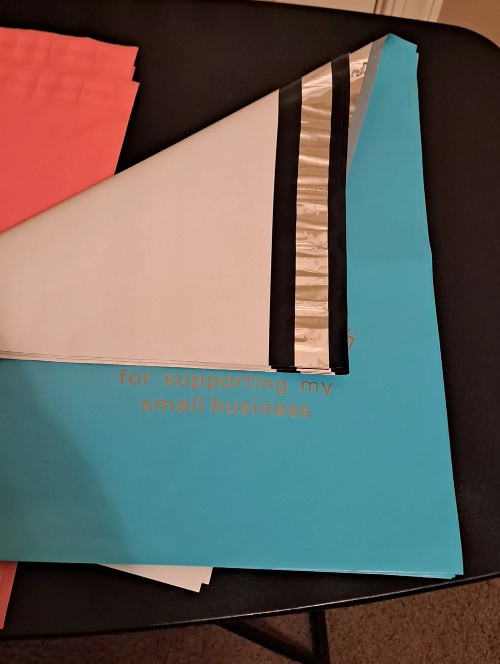 16 ct - Blue, Coral, White and Black 10x13 polymailers.  Four of each color.
